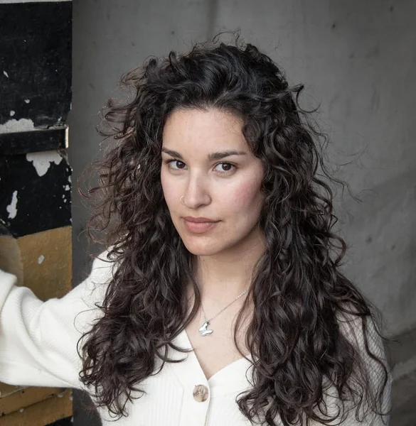 Long Natural Curls with Bouncy Face-Framing Layers