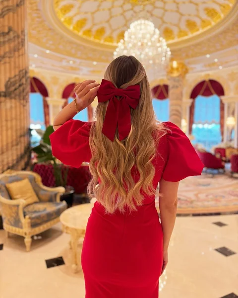 Luxurious Red Velvet Bow Hairstyle for Formal Christmas Parties