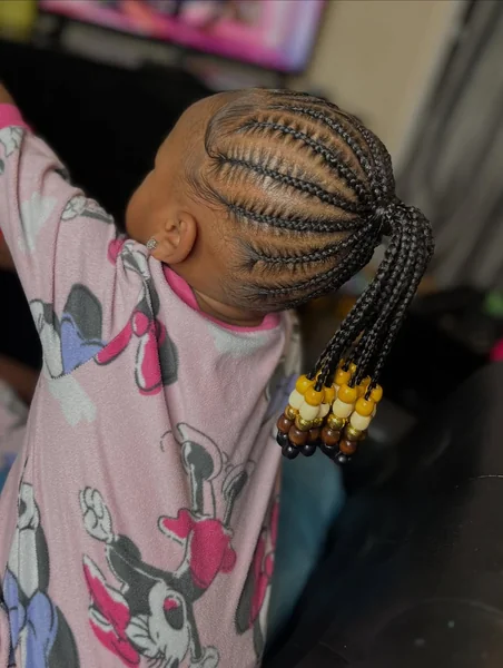 Neat Cornrow Ponytail with Gold and Amber Beads