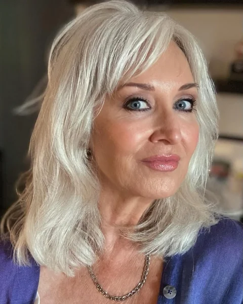 Pearlescent Silver Mid-Length Cut with Wispy Side Bangs