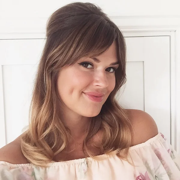 Retro Half-Updo with Voluminous Crown and Bangs