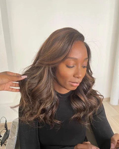 Rich Brunette Wavy Layers with Warm Balayage
