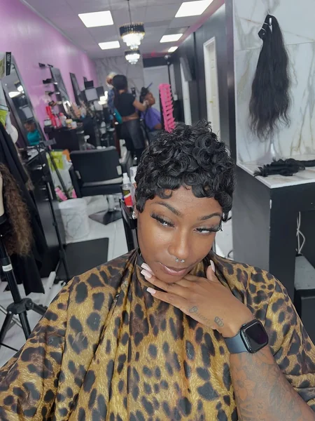 Sleek Baby Curl Pixie with Short Fringe