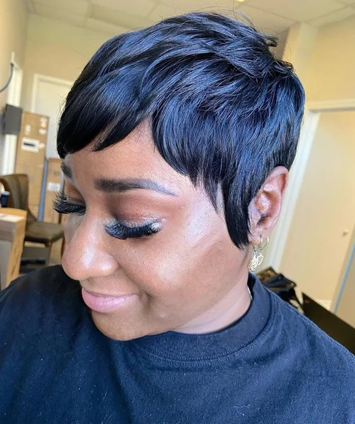 Sleek Feathered Black Pixie with Full Bang