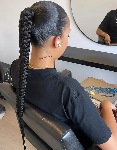 Sleek High Ponytail with Long, Structured Braid