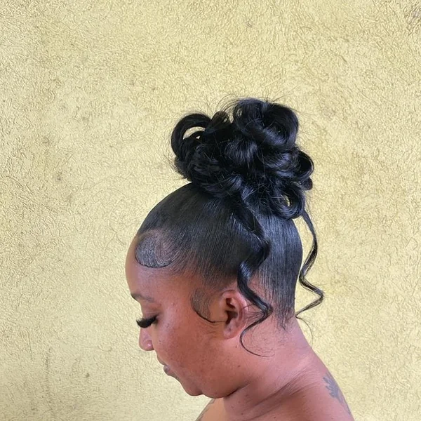 Sleek High Updo with Cascading Formal Curls