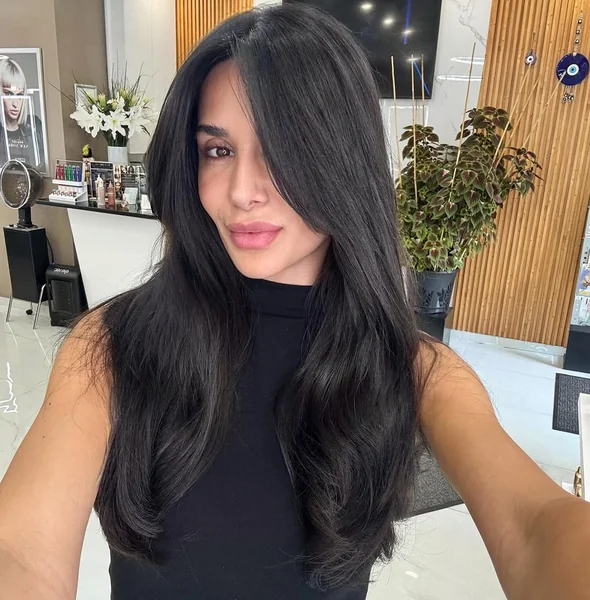 Sleek Long Butterfly Cut with Deep Side Sweep