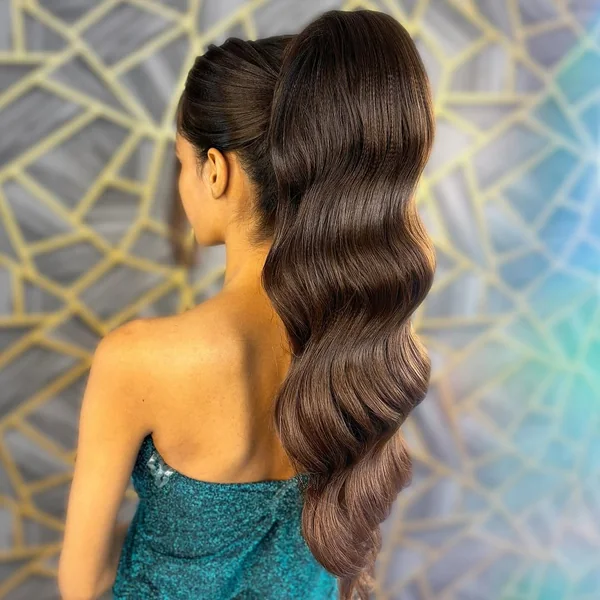 Smooth, Exaggerated High Ponytail with Structured Waves