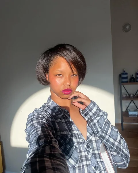 Smooth, Sleek Short Bob with Deep Side Sweep