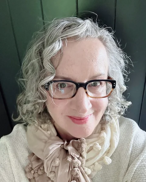 Soft Silver Curls with Elegant Side Parting