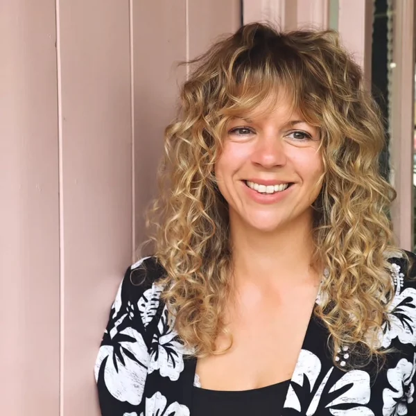 Sun-Kissed Curly Shag with Face-Framing Bangs