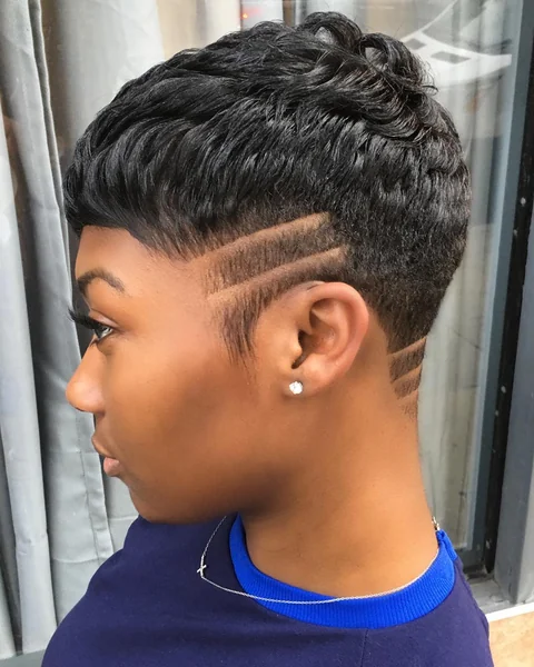 Textured Black Pixie Cut with Edgy Shaved Lines