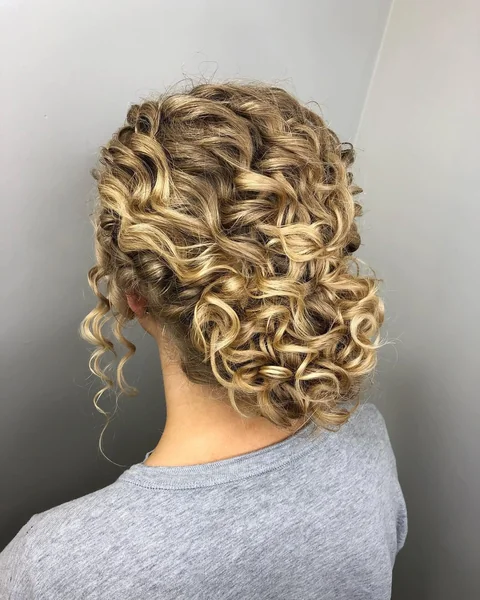 Textured Blonde Updo of Defined Curls and Ringlets