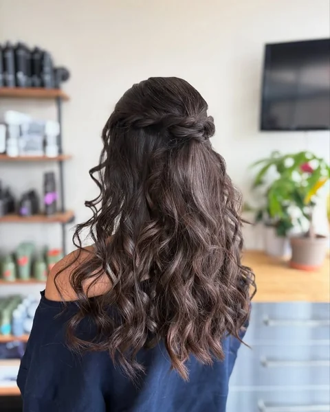 Timeless Low Chignon with Elegant Braided Sweep