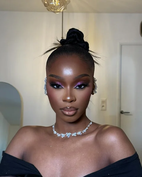 Ultra-Sleek High Spiked Top Knot Bun