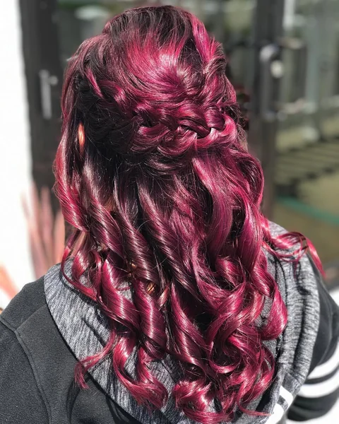 Vibrant Magenta Half-Up Braid with Spiral Curls
