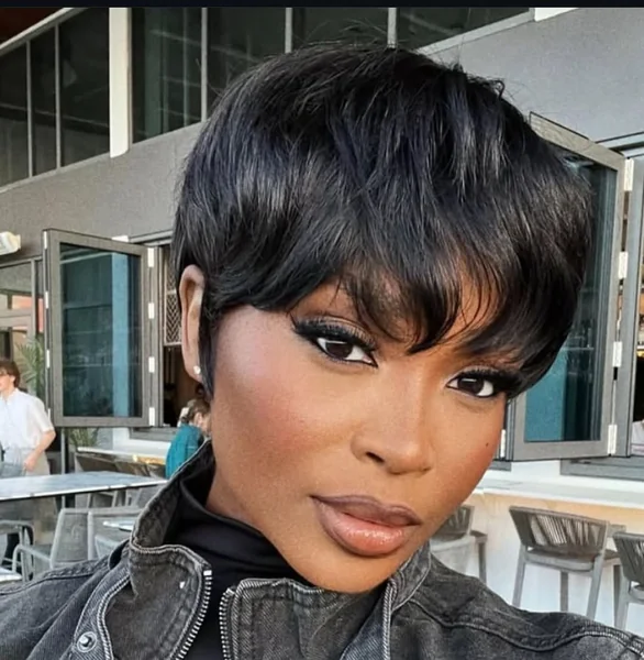 Voluminous Black Pixie with Long Swooping Fringe