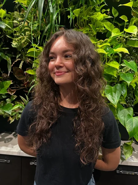 Voluminous Long Curly Layers with Face-Framing Shag