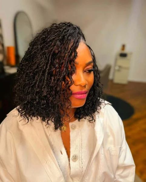 Voluminous Natural Curly Bob with Side Part