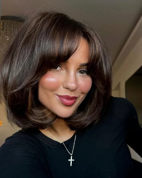 Voluminous Short Bob with Full Curtain Bangs