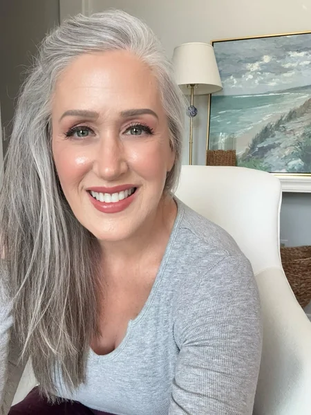 Voluminous Silver Mane with Swept-Back Roots