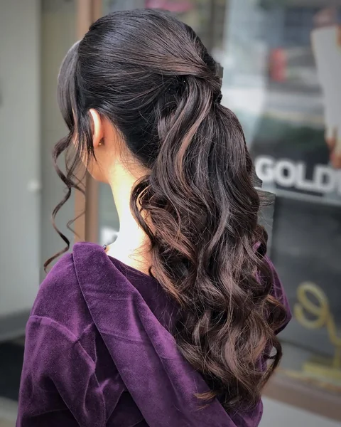 Voluminous Wavy High Ponytail for Drama