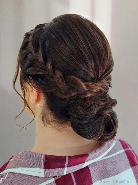 Voluminous Wavy High Updo with Cascading Texture