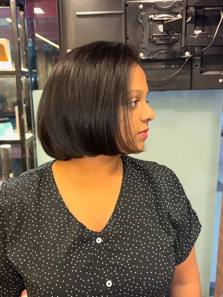 Wavy Dimensional Bob with Blonde Highlights