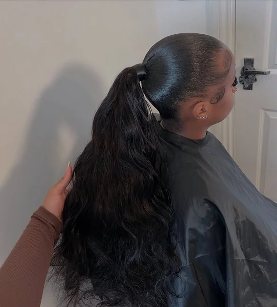 Auburn Mid-Ponytail with Voluminous Barrel Waves