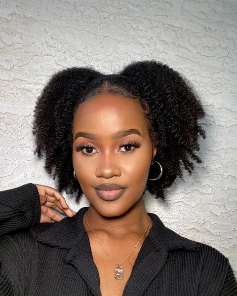 Chic Symmetrically Tapered Afro with Soft Defined Coils