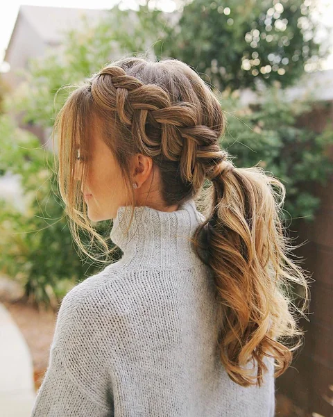 cornrow ponytail with bangs