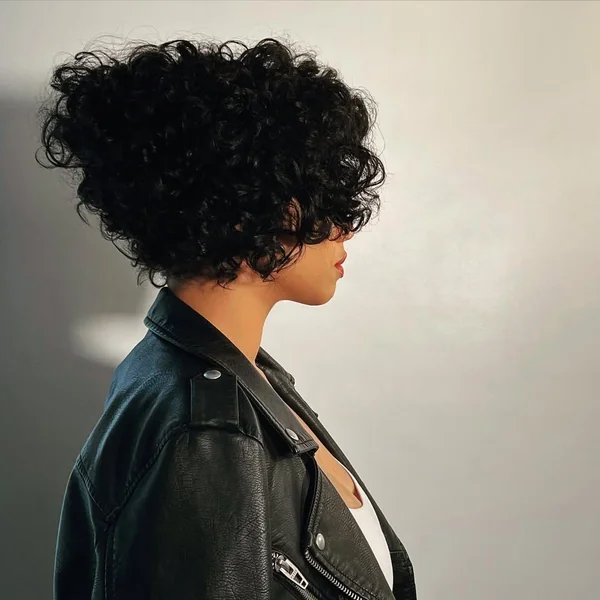 Dramatic Inverted Curly Bob with Maximum Volume