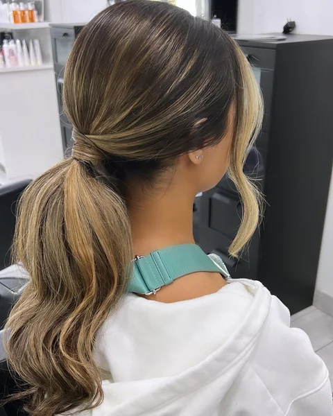 low ponytail with bangs