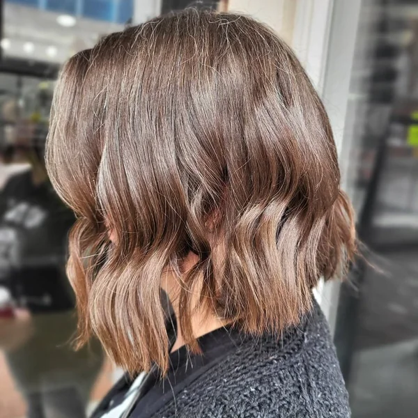 Feathered Platinum Shaggy Bob for Women Over 50