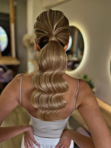 Glamorous Bridal Low Ponytail with Soft Waves