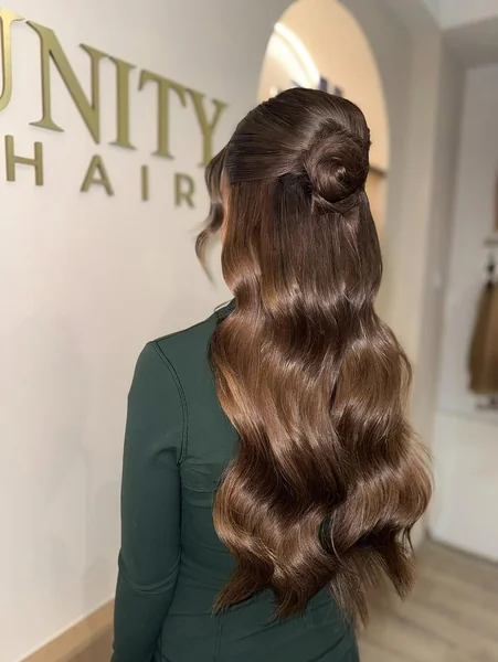 Glamorous Half-Up Waves with Rolled Detail