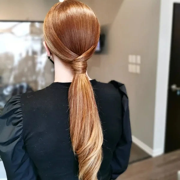 Glossy Copper Ponytail with Elegant Twisted Base