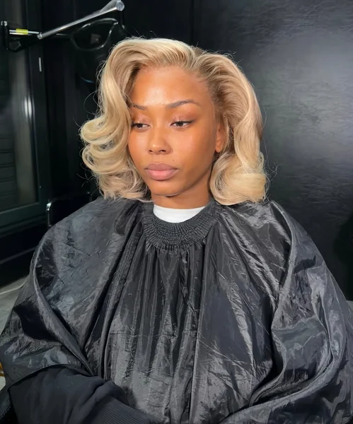 Honey Blonde Bombshell Bob with Glamorous Voluminous Waves