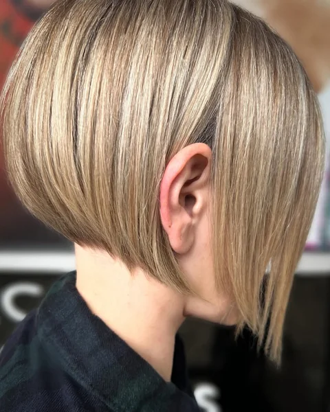 Honey Blonde Inverted Bob with Voluminous Feathered Layers