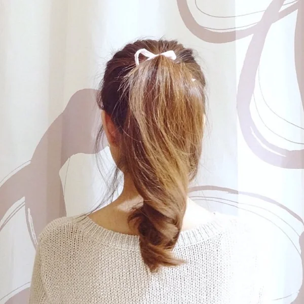 Natural Medium-Length Layers and Subtle Warm Balayage