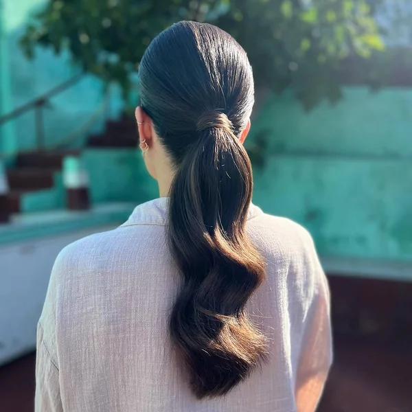 Perfectly Slick Dark Ponytail with Low Wrap Detail