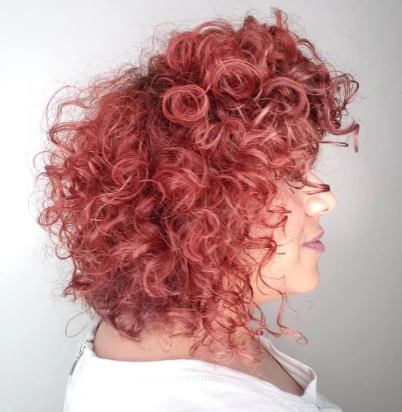 Radiant Rose-Gold Curly Bob with Piecey Ringlets
