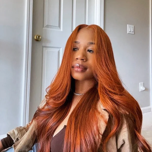 Sleek Ginger Copper Layers with Soft Face-Framing Flips