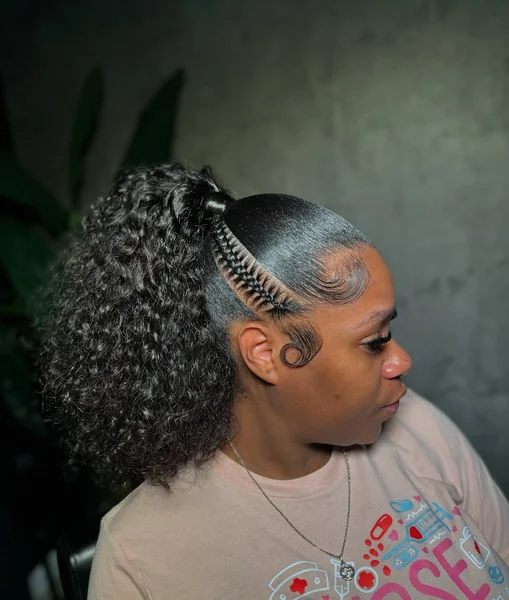 Sleek High Ponytail with Braided Detail and Curls
