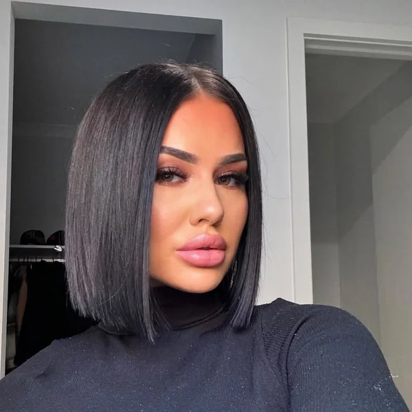 Sleek Ink-Black Blunt Cut Bob with Center Part