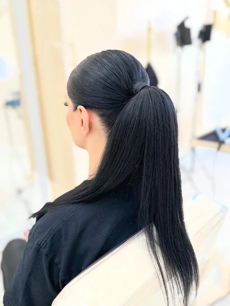 Sleek Jet Black High Ponytail with Wrapped Base