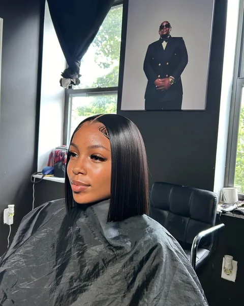 Sleek Middle-Parted Blunt Bob with Sculpted Edges