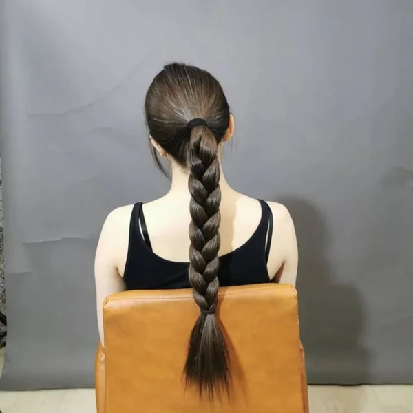 Slick Back Low Ponytail with Soft Waved Ends