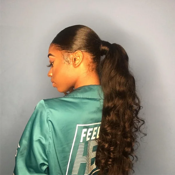 Smooth High Ponytail with Luscious Loose Waves