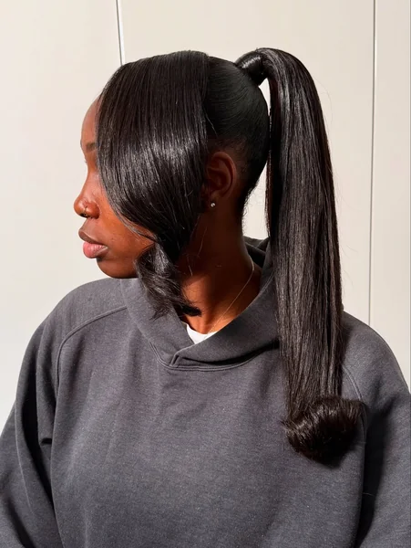 Ultra-Sleek High Ponytail with Voluminous Side Bang